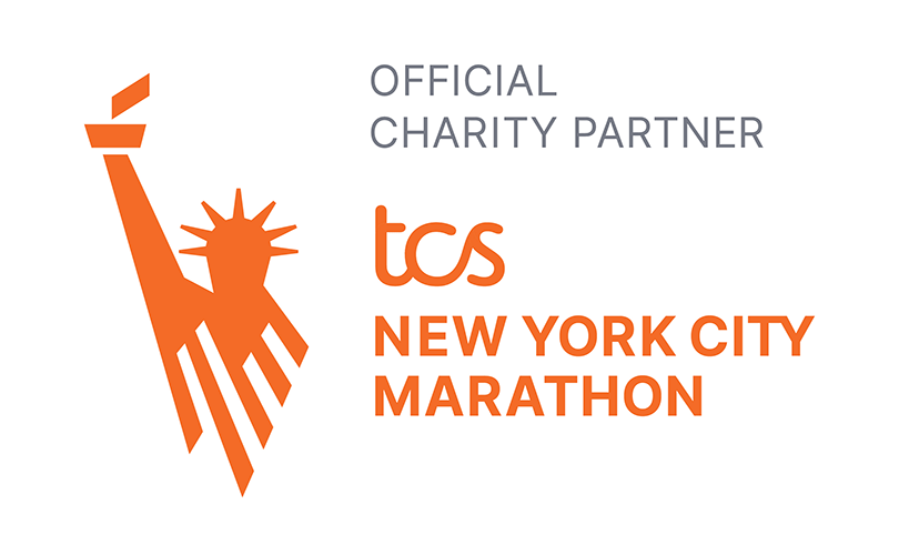 Official Charity Partner graphic for the TCS New York City Marathon, with an orange stylized Statue of Liberty holding a torch beside the event name.